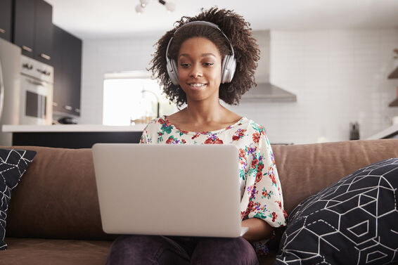 Woman writing dialogue on computer